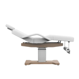 Table de massage électrique fixe blanche avec dossier inclinable et structure bois - Vue isométrique