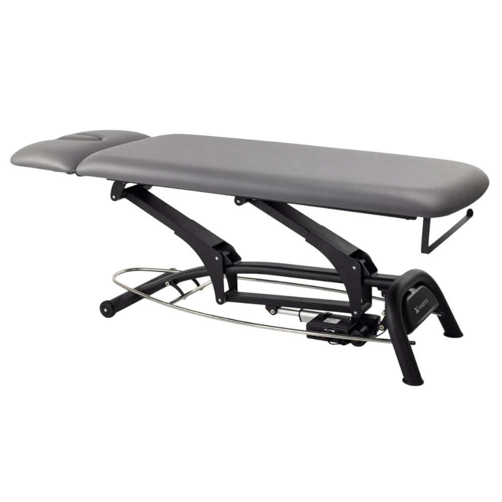 Table de massage électrique fixe grise avec repose-tête ajustable et structure noire - Vue isométrique