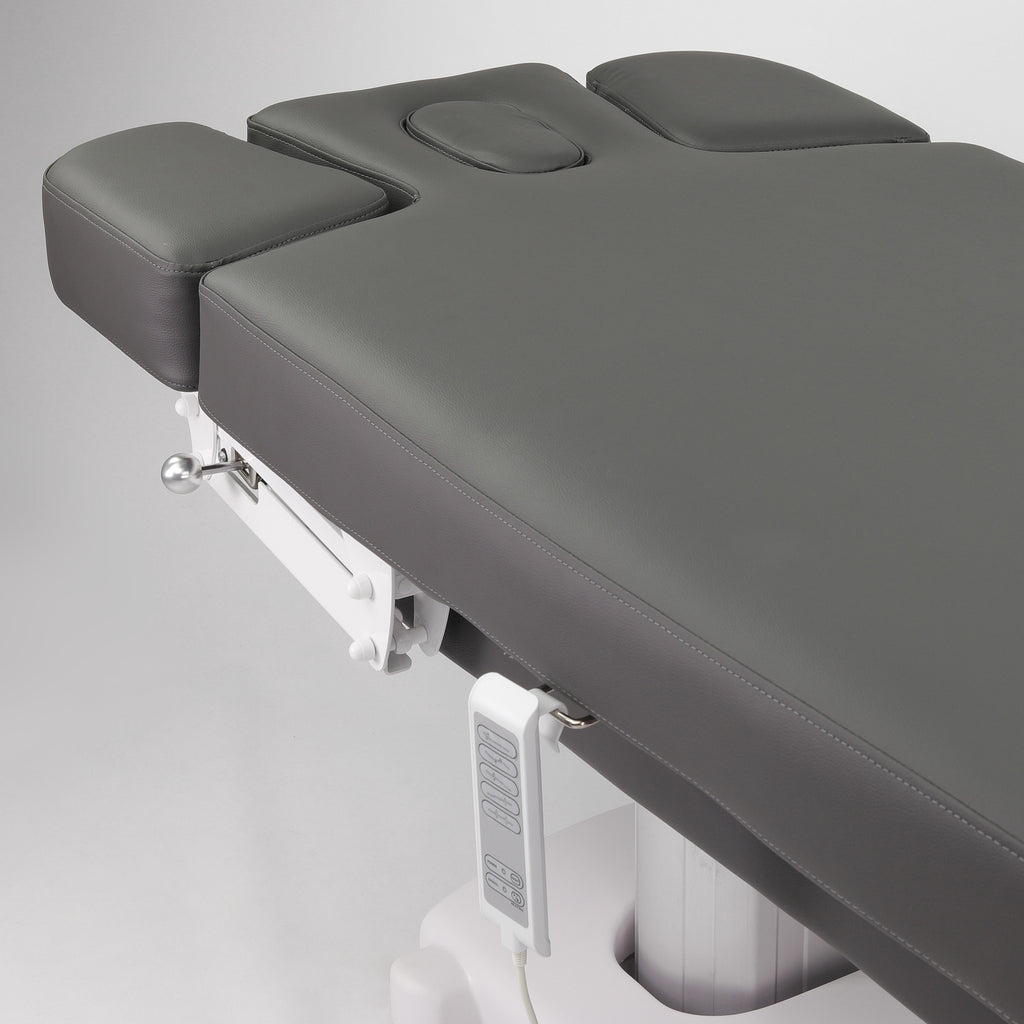 Table de massage électrique fixe avec coussin ergonomique ajustable et repose-pieds