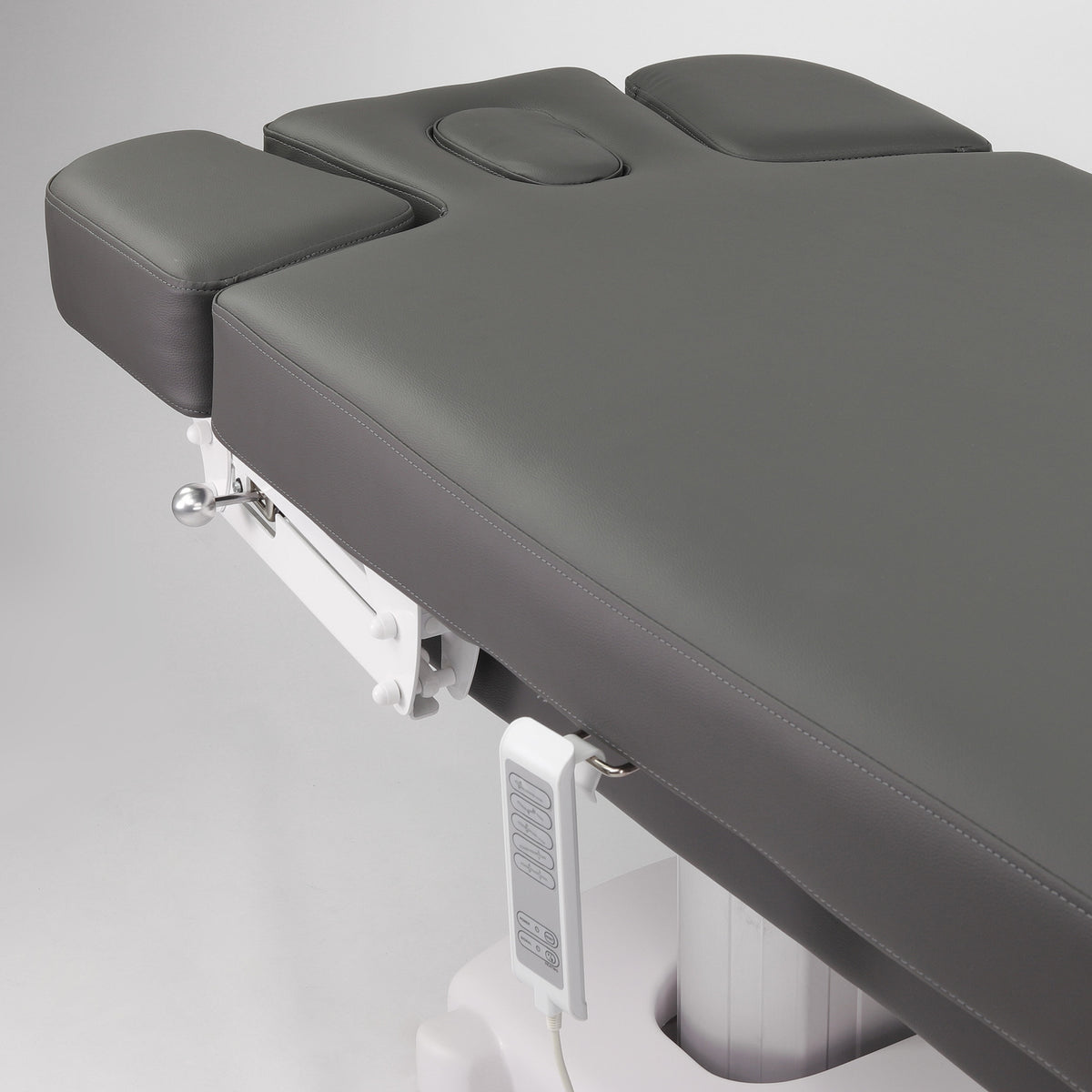 Table de massage électrique fixe avec coussin ergonomique ajustable et repose-pieds
