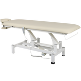 Table de massage électrique fixe couleur vanille avec repose-tête ajustable et structure blanche - Vue isométrique