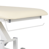 Détail du support porte-rouleau intégré pour table de massage couleur vanille - Barre blanche de fixation
